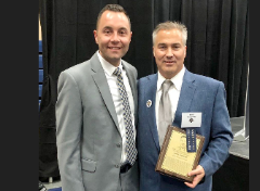Chris Wenzler with JCU campus VP of communications Mike Scanlan after Chris was inducted into the JCU hall of fame.